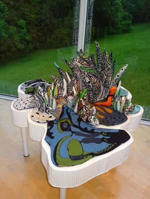 Fiber art Sculpture using IKEA fabrics, representing the Everglades. The base is made of wood with organic shape. This piece won Best in show at the Florida Art Competition.